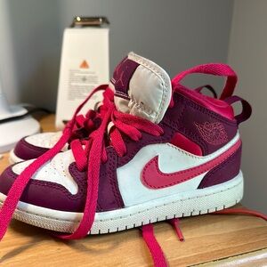 Nike Pink and White Sneakers with Classic Design